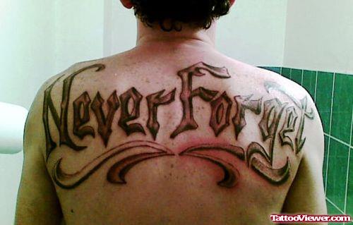 Never Forget Ambigram Tattoo On Upperback