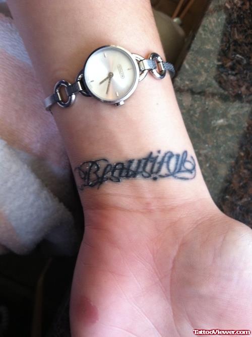 Beautiful Ambigram Tattoo On Left Wrist