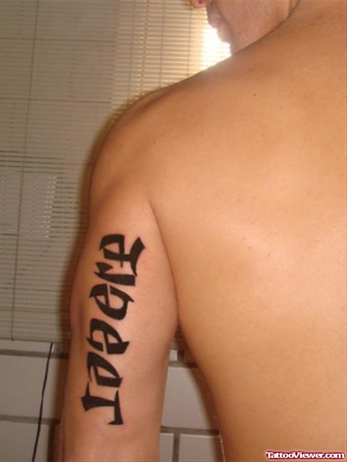 Ambigram Tattoo On Man Left Half Sleeve