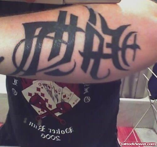 Death Ambigram Tattoo On Left Arm