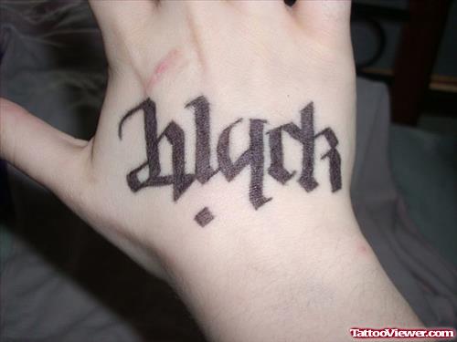 Black Ambigram Tattoo On Right Hand