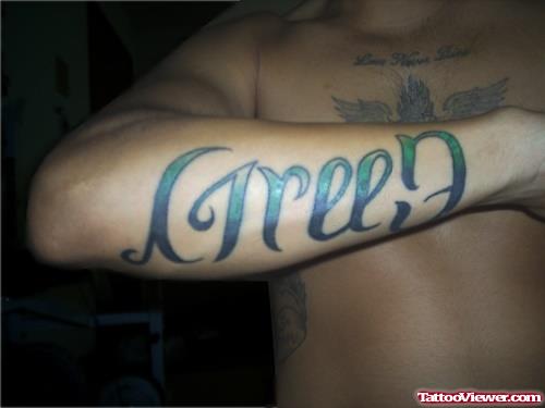 Best Green Ambigram Tattoo On Right Arm