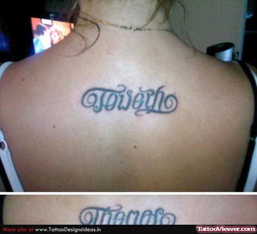 Ambigram Tattoo On Girl Upperback