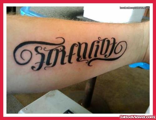 Ambigram Strength Tattoo On Arm