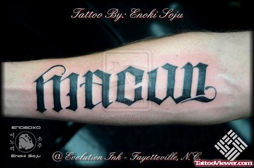 Black Ink Ambigram Tattoo On Forearm