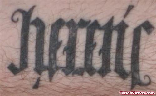 Heretic Ambigram Tattoo