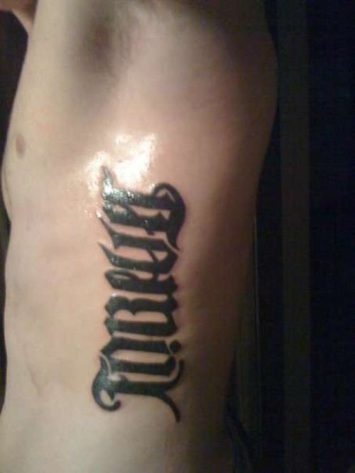 Family Forever Ambigram Tattoo On Side Rib