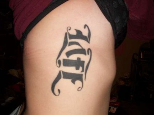 Life Ambigram Tattoo On Side Rib