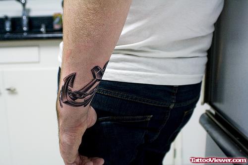 Grey Anchor Tattoo On Left Wrist