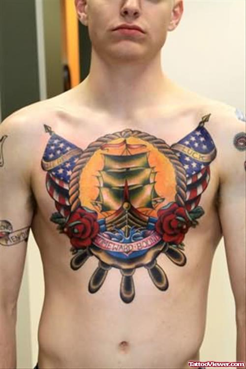 Colored Ship And Anchor Tattoo On Chest