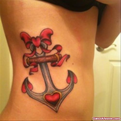 Anchor With Bow Tattoo On Side Rib