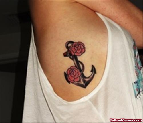Red Flowers And Anchor Tattoo On Side