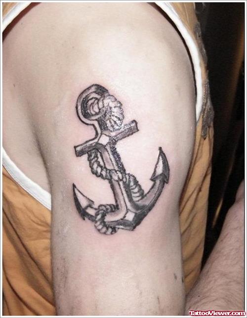 Grey Ink Anchor Tattoo On Left Bicep