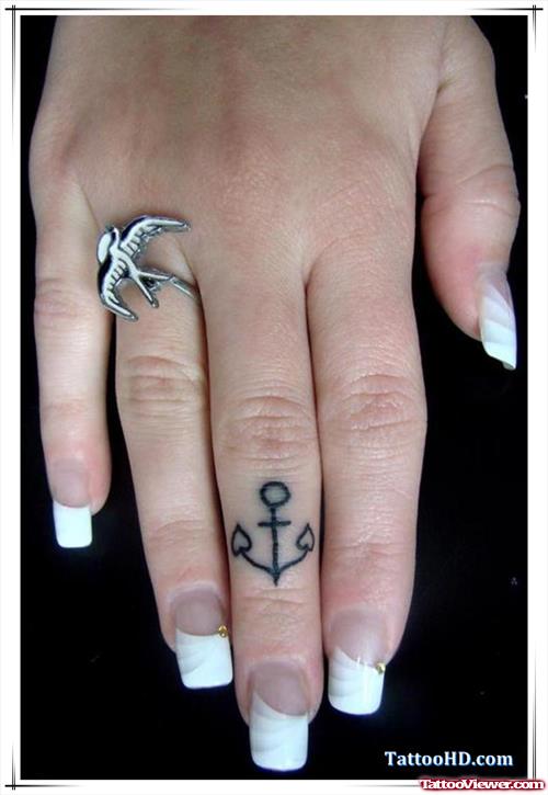 Traditional Anchor Tattoo On Middle Finger