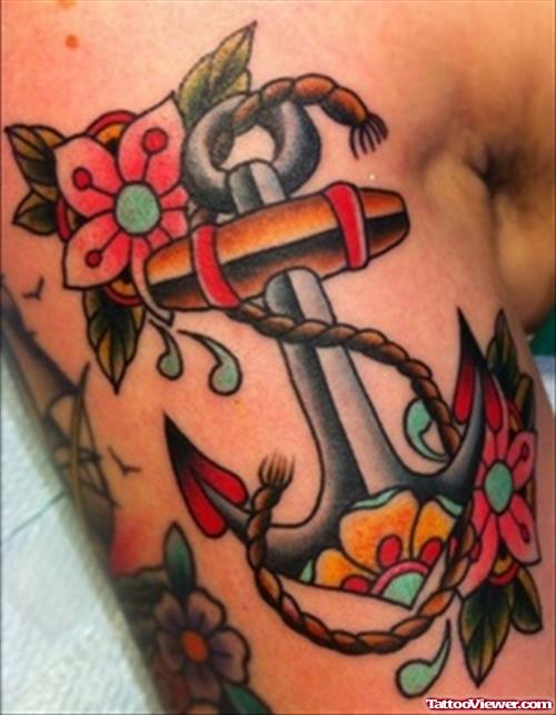 Small Red Flowers And Anchor Tattoo