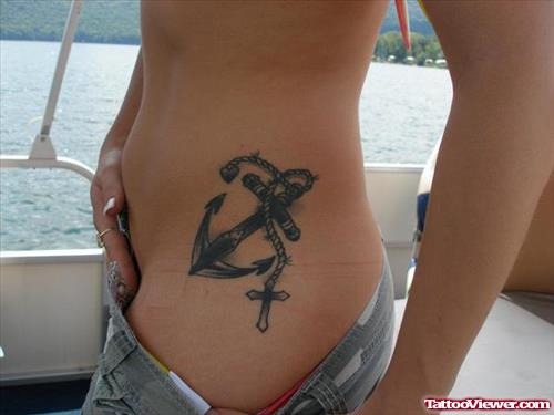 Roary And Anchor Tattoo On Side