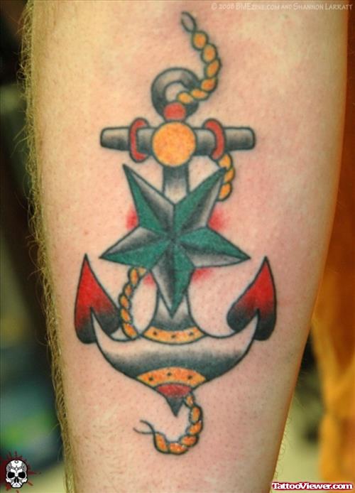 Nautical Star And Colored Anchor Tattoo On Leg