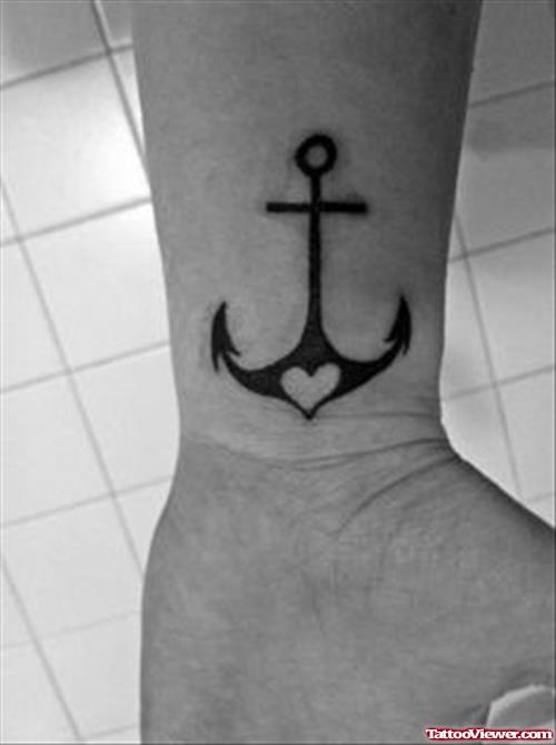 Tiny Heart And Anchor Tattoo On Wrist