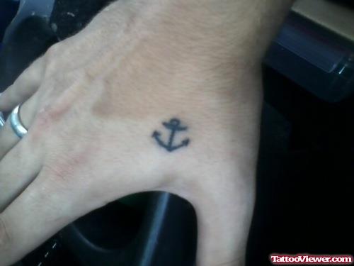 Tiny Anchor Tattoo On Right Hand