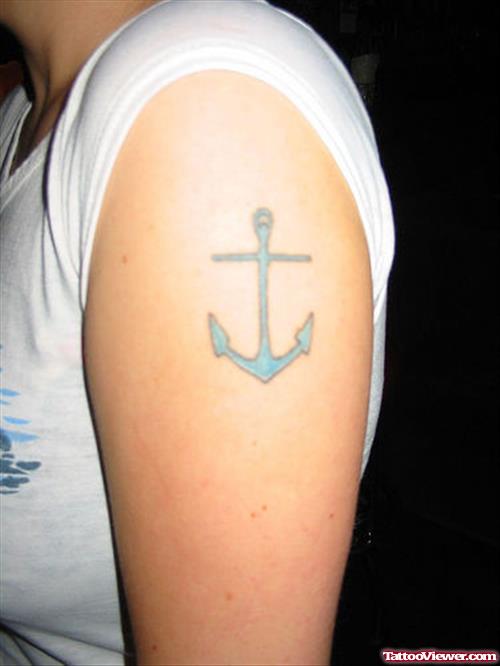 Blue Anchor Tattoo On Left Shoulder