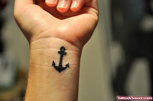 Awesome Black Anchor Tattoo On Left Wrist