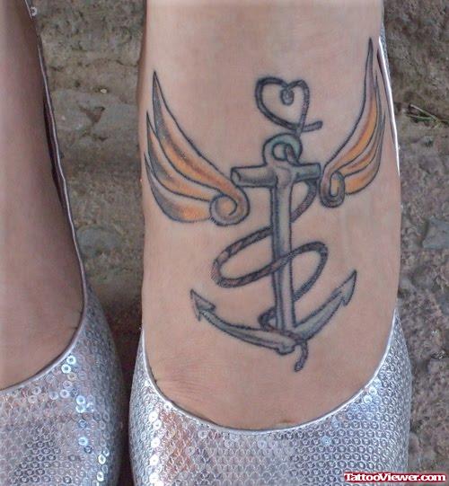 Winged Anchor Tattoo On Left Foot