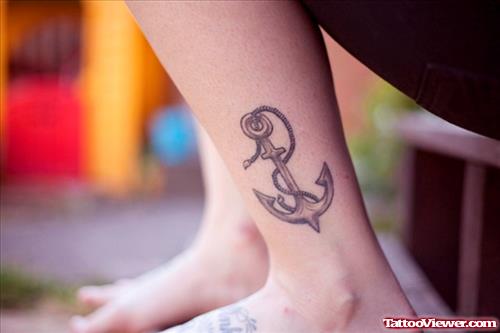 Grey Ink Anchor And Rope Tattoo