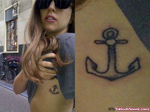 Girl Showing Her Anchor Tattoo