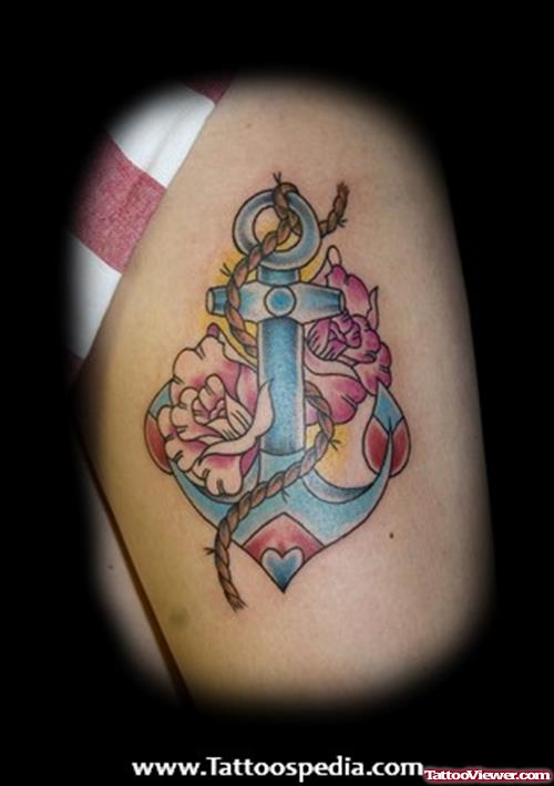 Flowers And Anchor Tattoo On Bicep