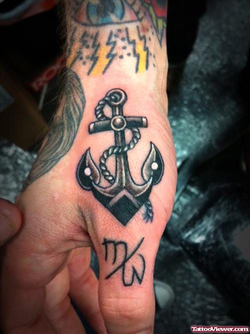 Black Ink Anchor Tattoo On Right Hand
