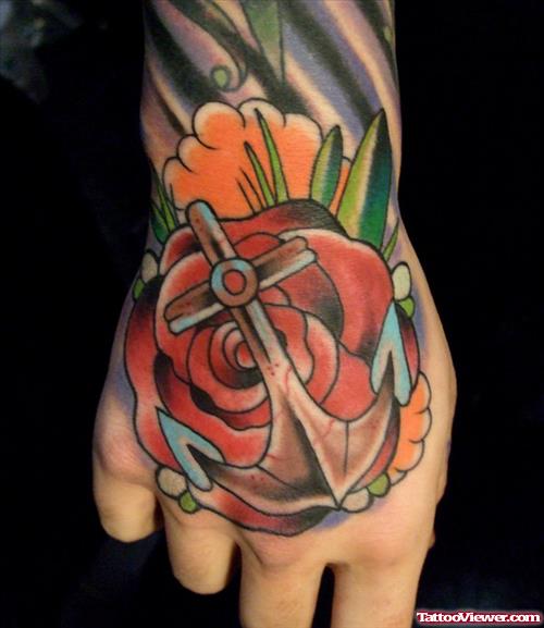 Red Rose Flower And Anchor Tattoo On Hand