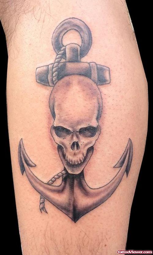 Grey Ink Anchor Tattoo With Skull