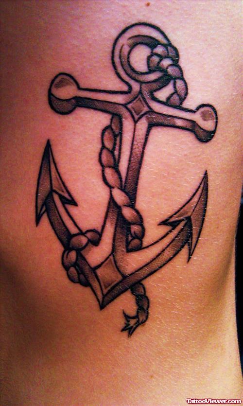Grey Ink Anchor Tattoo On Rib