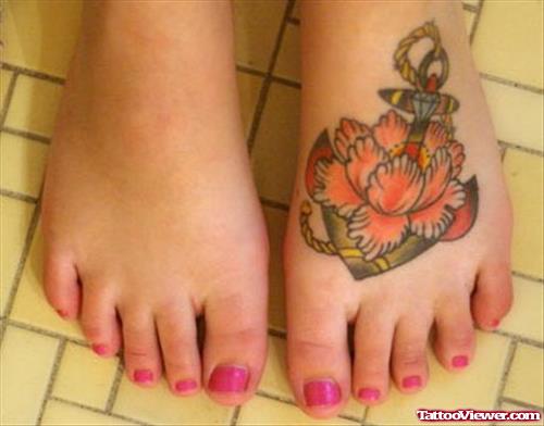 Girl With Flower And Anchor Tattoo On Left Foot