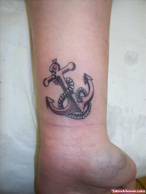 Grey Rope And Anchor Tattoo On Wrist