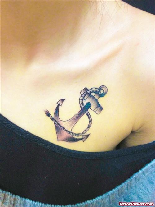 Anchor Tattoo On Girl Chest