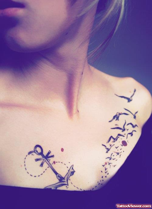 Flying Birds And Anchor Tattoo On Girl Chest