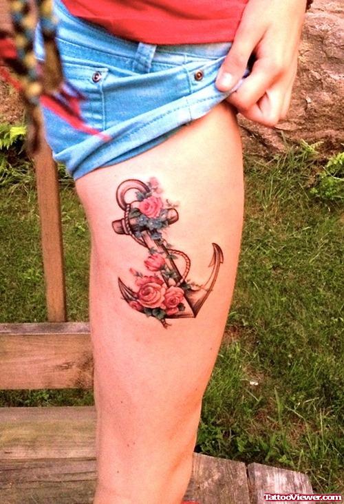 Colored Anchor Tattoo On Girl Right Thigh