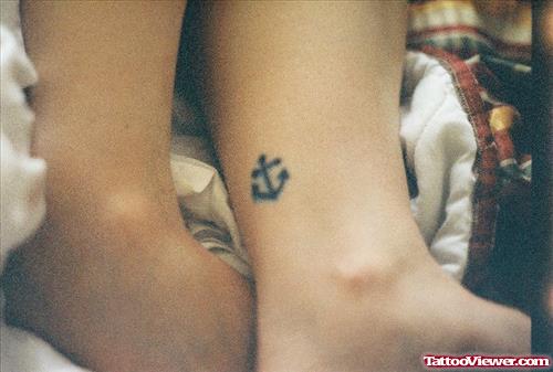 Amazing Black Small Anchor Tattoo On Ankle