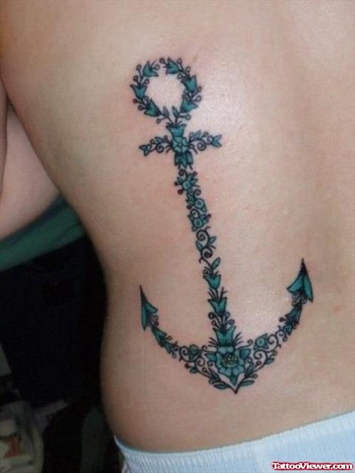 Flowers Anchor Tattoo On Back
