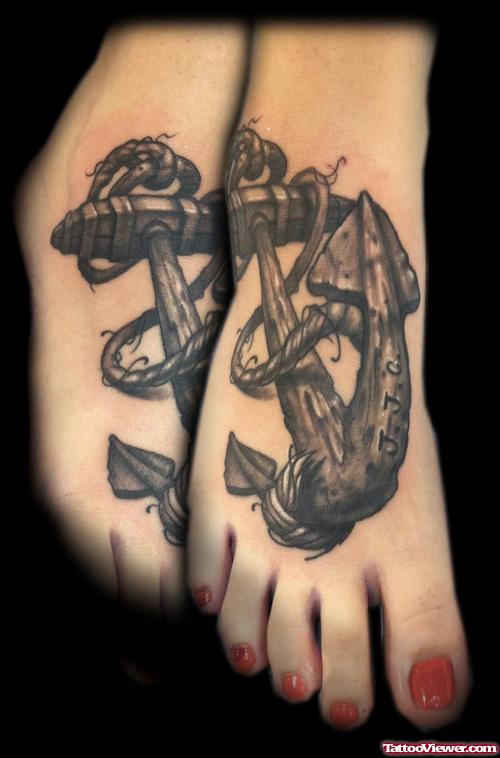 Black And Grey Ink Anchor Tattoos On Girl Feet