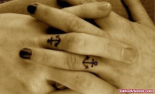 Black Anchor Tattoo On Finger