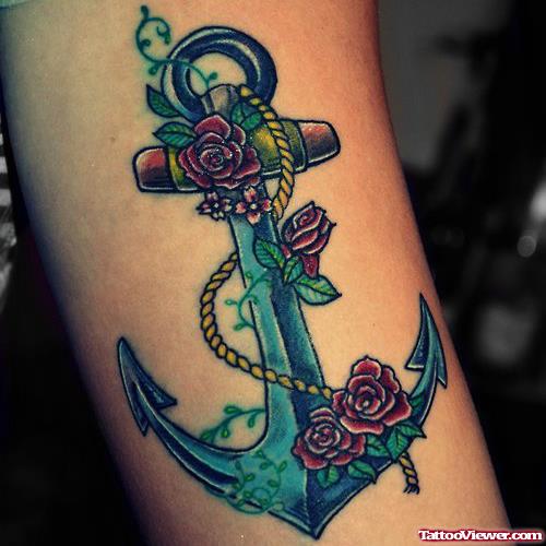 Awesome Rose Flowers And Anchor Tattoo
