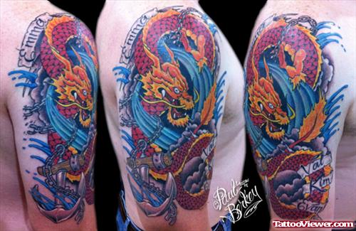 Colored Dragon And Anchor Tattoo
