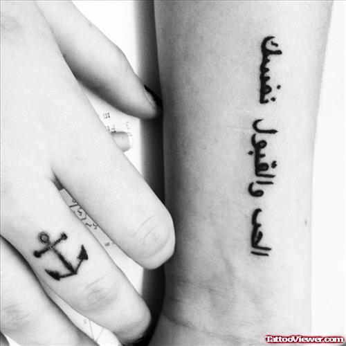 Arabic And Anchor Tattoos