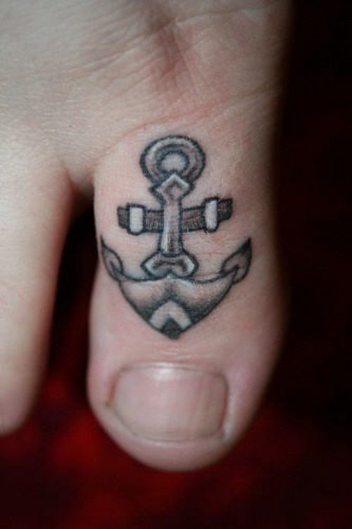 Small Grey Anchor Tattoo On Toe