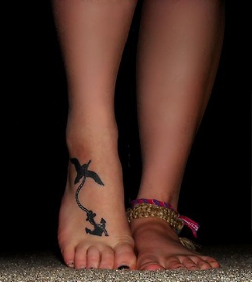 Flying Bird And Anchor Tattoo On Girl RIght Foot