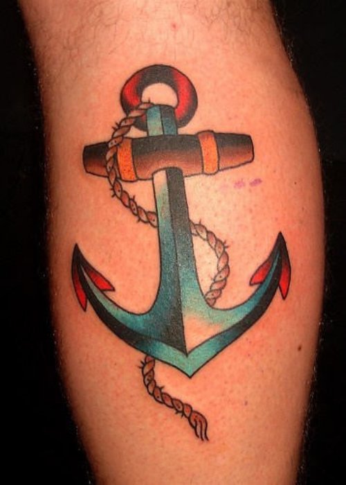 Blue Ink Anchor Tattoo On Back Leg