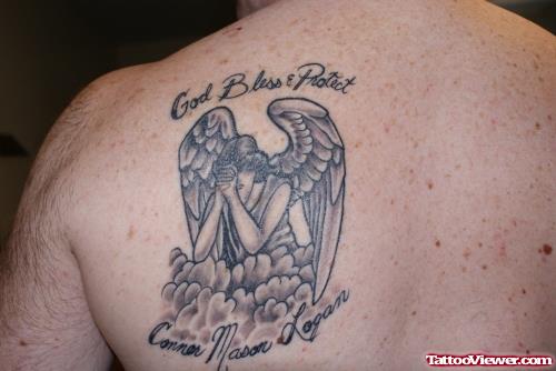 God Bless And Protect Angel Grey Ink Tattoo On Left Back Shoulder