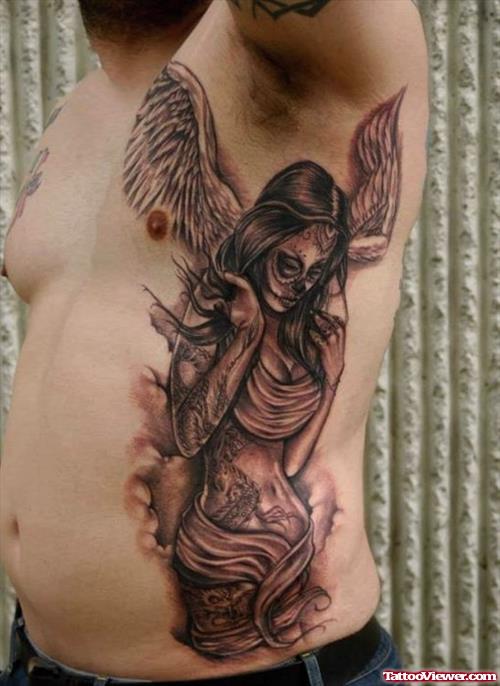 Grey Ink Gysy Angel Tattoo On Man Side Rib